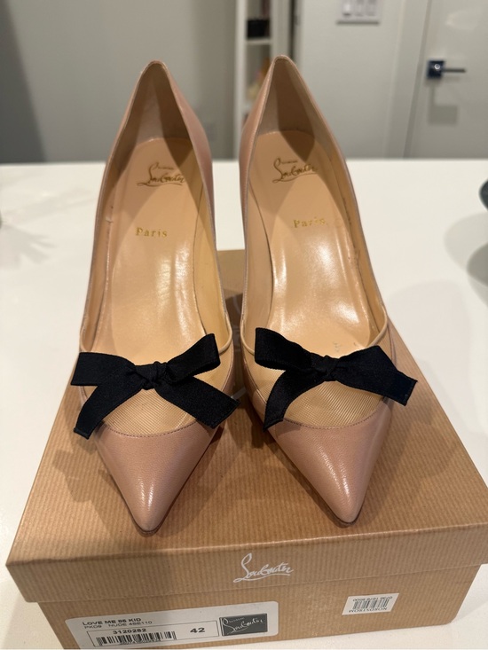 Christian Louboutin Shoes - Christian Louboutin Blush Nude Pointed-Toe Pumps with Black Bows